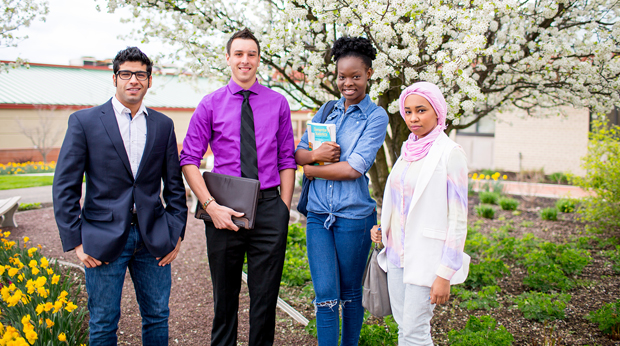 International students standing in front of library